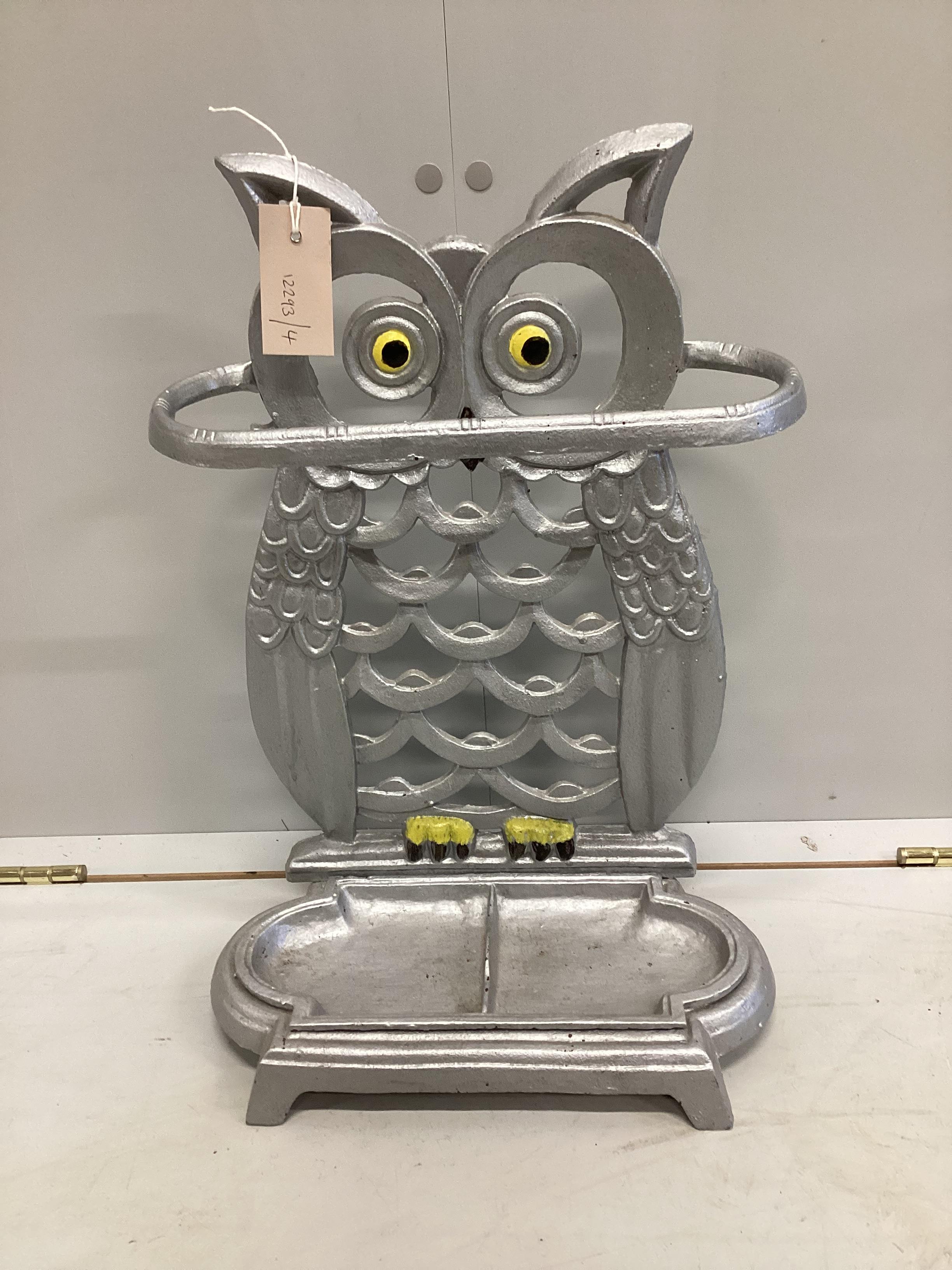 A painted cast metal owl stick stand, height 48cm